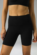 Pantalones cortos de yoga Dreamlux de cintura alta de 6" con bolsillos