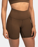 Pantalones cortos de yoga Dreamlux de cintura alta de 6" con bolsillos