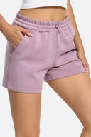 Shorts lounge de modal de 4" con bolsillos