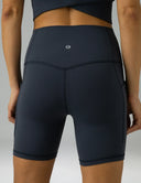 Pantalones cortos de yoga Dreamlux de cintura alta de 6" con bolsillos