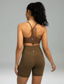 Pantalones cortos de yoga Dreamlux de cintura alta de 6" con bolsillos