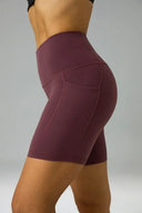 Pantalones cortos de yoga Dreamlux de cintura alta de 6" con bolsillos