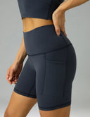 Pantalones cortos de yoga Dreamlux de cintura alta de 6" con bolsillos