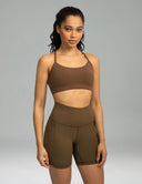 Pantalones cortos de yoga Dreamlux de cintura alta de 6" con bolsillos