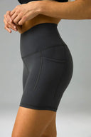 Pantalones cortos de yoga Dreamlux de cintura alta de 6" con bolsillos