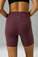 Pantalones cortos de yoga Dreamlux de cintura alta de 6" con bolsillos