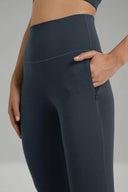 Legging acampanado Dreamlux de 29,5" con bolsillos con cremallera