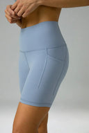 Pantalones cortos de yoga Dreamlux de cintura alta de 6" con bolsillos