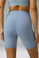 Pantalones cortos de yoga Dreamlux de cintura alta de 6" con bolsillos