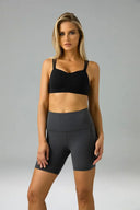 Pantalones cortos de yoga Dreamlux de cintura alta de 6" con bolsillos