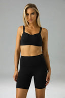 Pantalones cortos de yoga Dreamlux de cintura alta de 6" con bolsillos