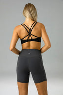 Pantalones cortos de yoga Dreamlux de cintura alta de 6" con bolsillos