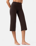 Women's high-waisted cropped yoga pants in dark brown activewear fabric.