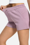 Shorts lounge de modal de 4" con bolsillos