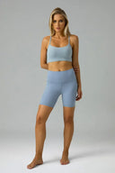Pantalones cortos de yoga Dreamlux de cintura alta de 6" con bolsillos
