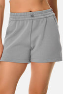Shorts lounge de modal de 4" con bolsillos